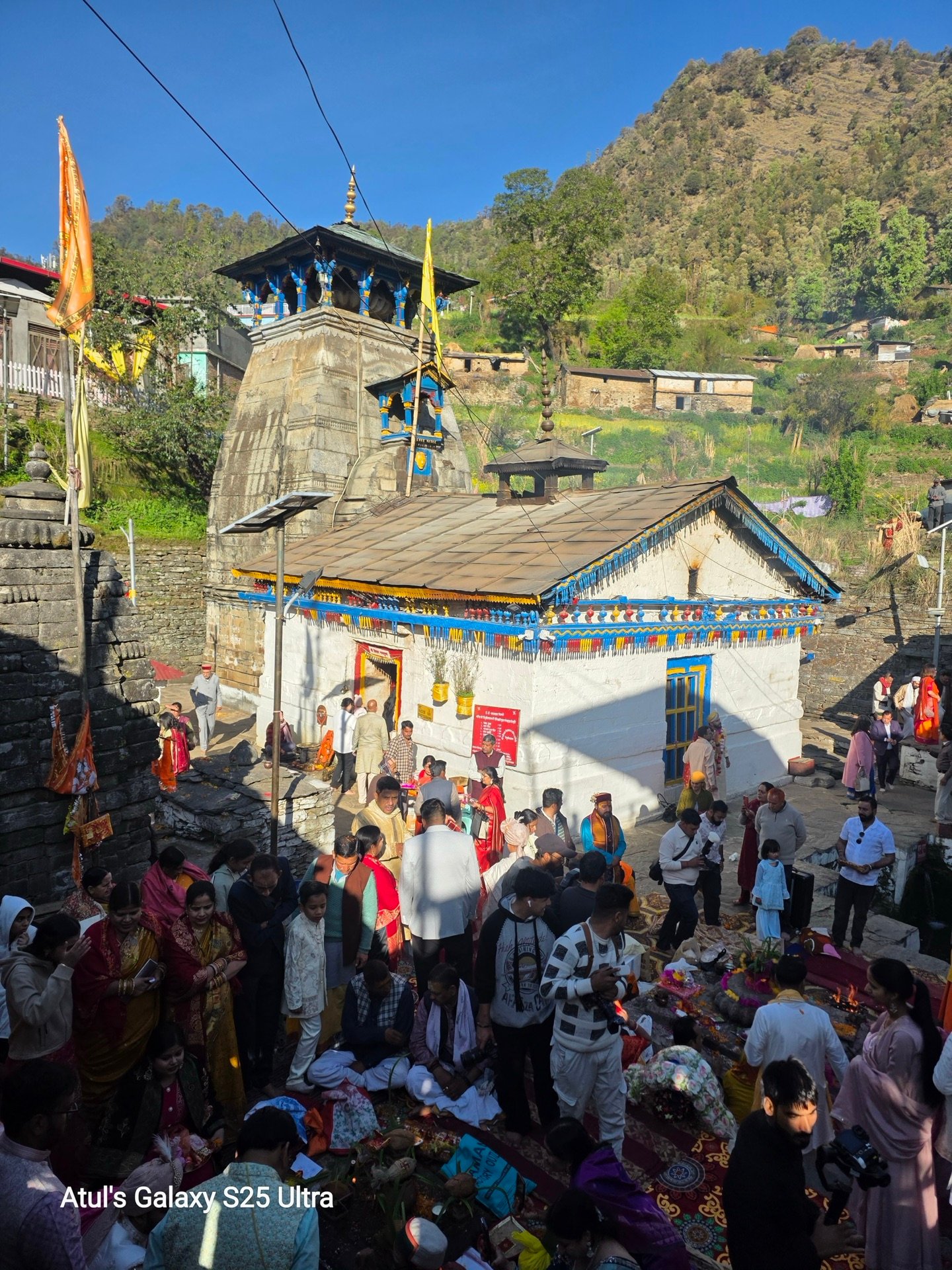 Side-angle view of Triyuginarayan Temple showing the stone slab architecture