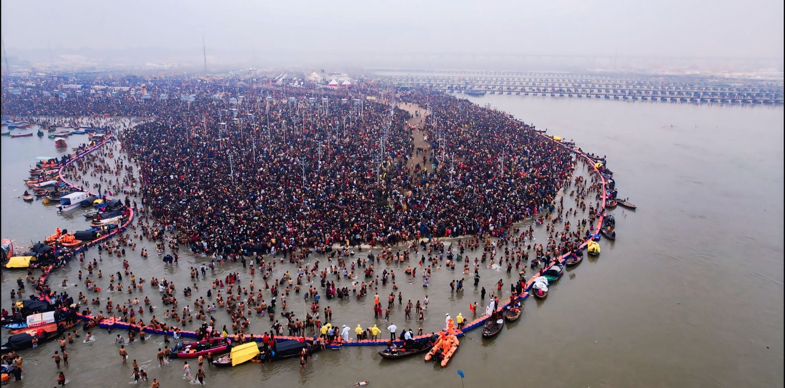 Aerial view of the Sangam during Shahi Snan - tens of thousands of pilgrims bathing