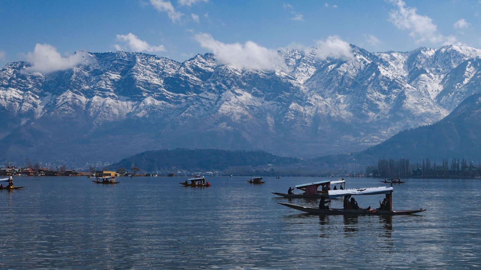 Dal Lake below the snow-covered mountains, Srinagar, Kashmir