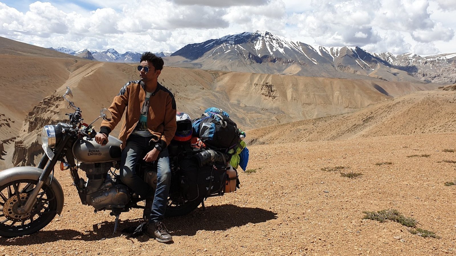 A loaded motorcycle in the high desert of Ladakh