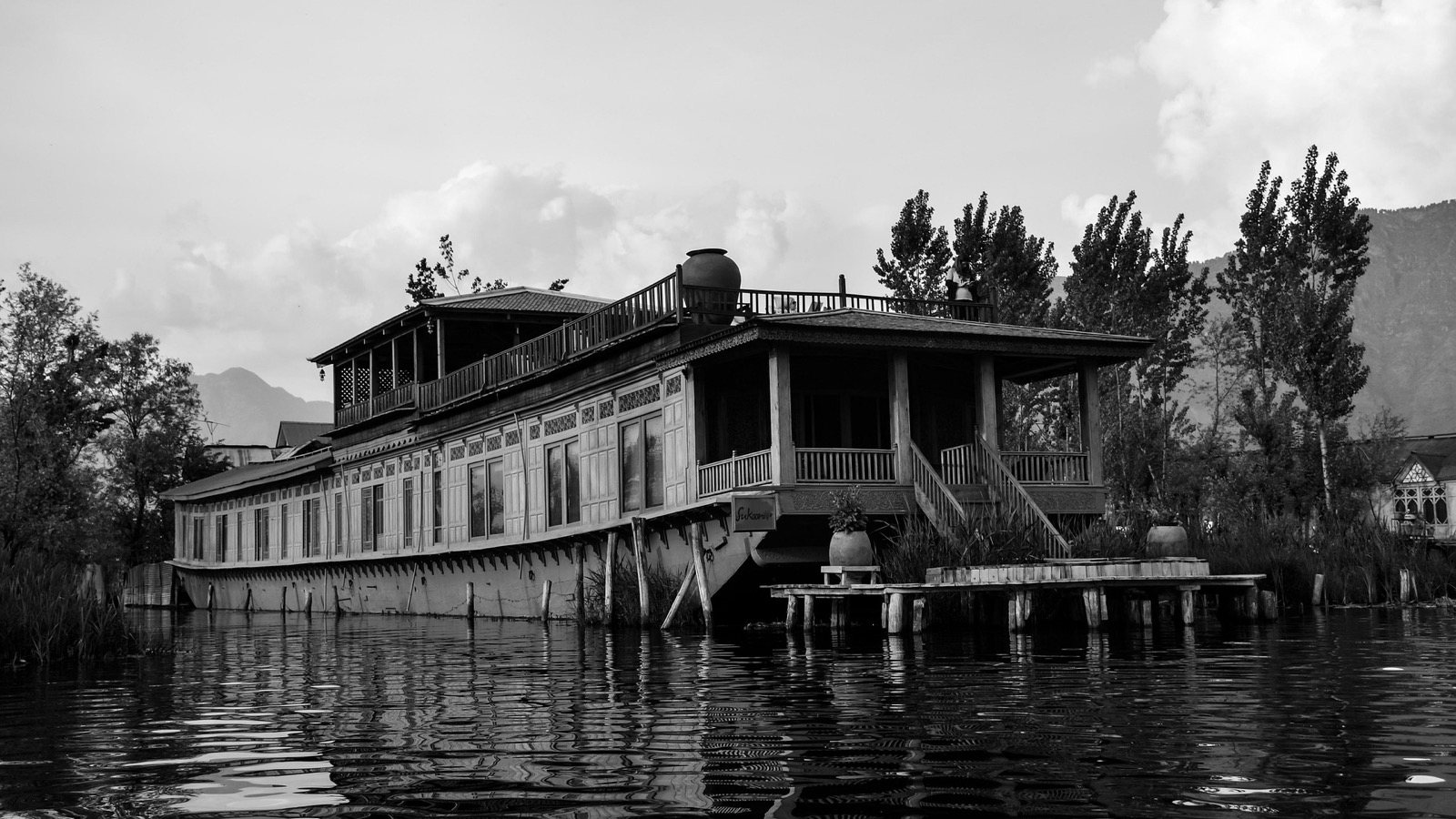 A traditional houseboat on the water at Srinagar, Kashmir